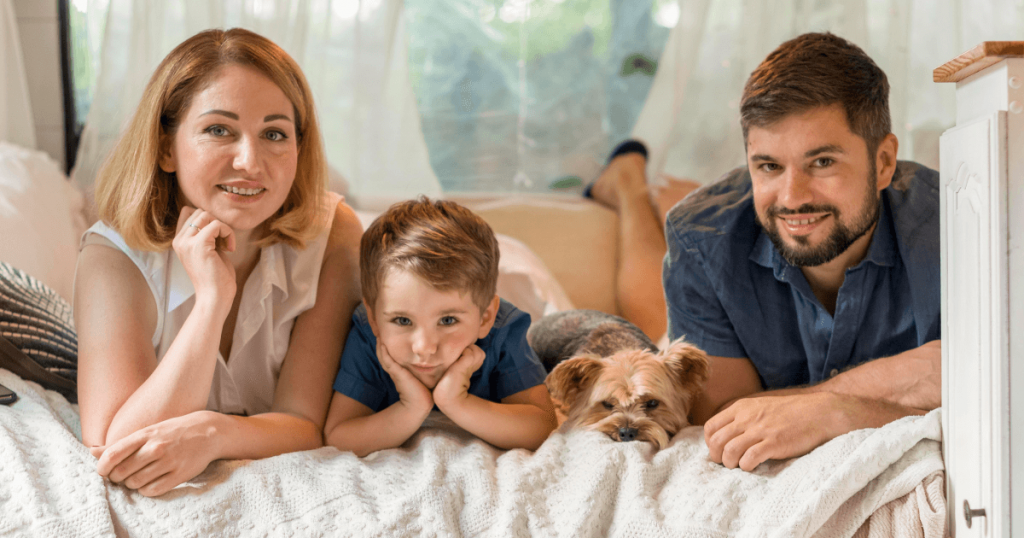 A family with a pet showcasing to make your Vacation Rental Property as Pet and Family-Friendly